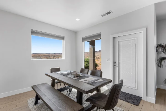 Dining area with two large windows framing desert mesa views, Washington, Utah